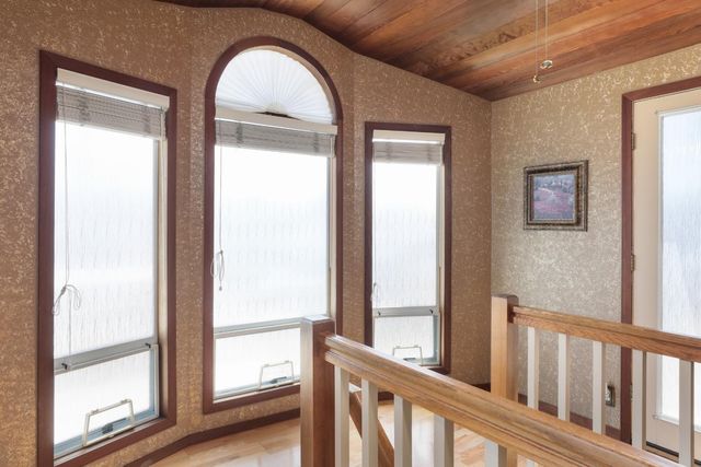 a view of staircase with rug floor