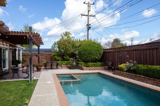 a garden view with a sitting space