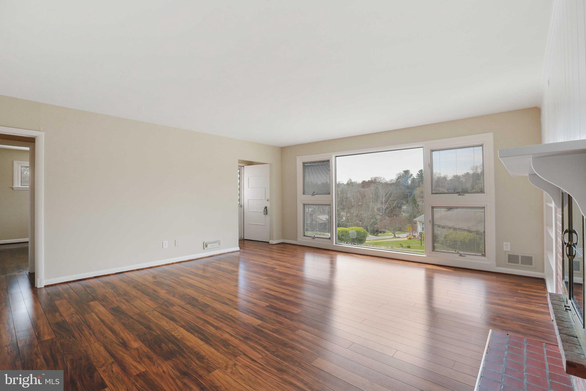 6701 Canongate Road Baltimore, MD 21239 - Photo 8 of 27 LIVING ROOM TOWARDS FRONT DOOR