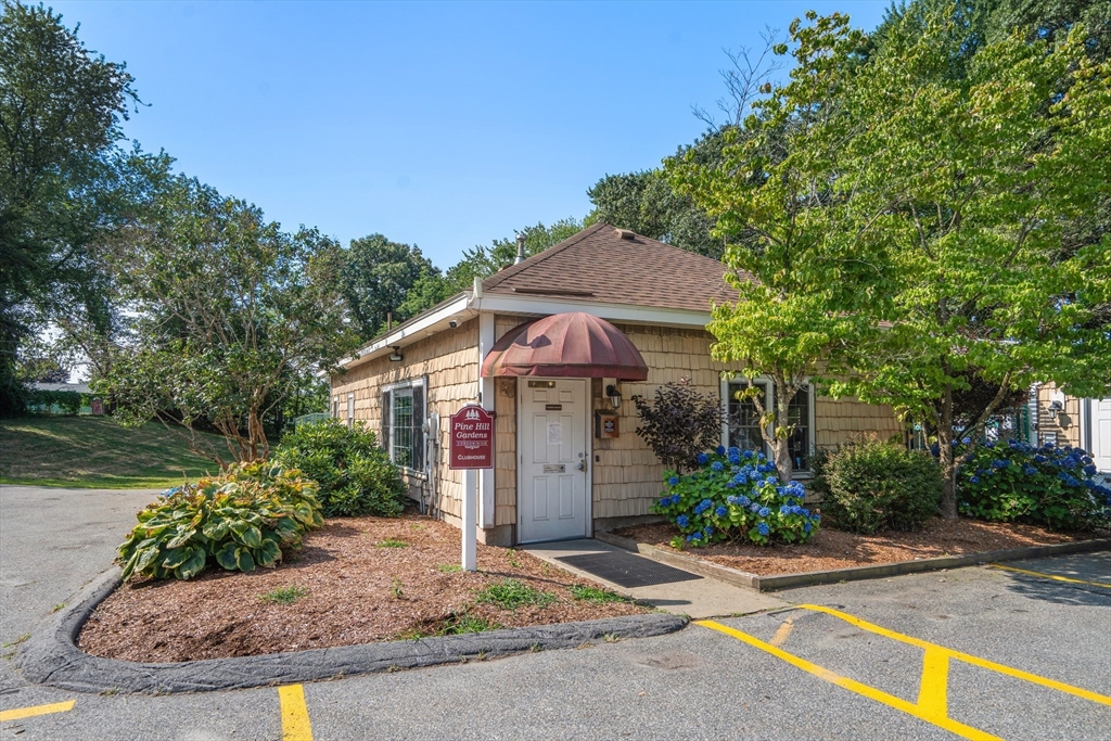 88 Beacon Street, Unit 7 Lawrence, MA 01843 - Photo 27 of 34 a front view of a house with garden