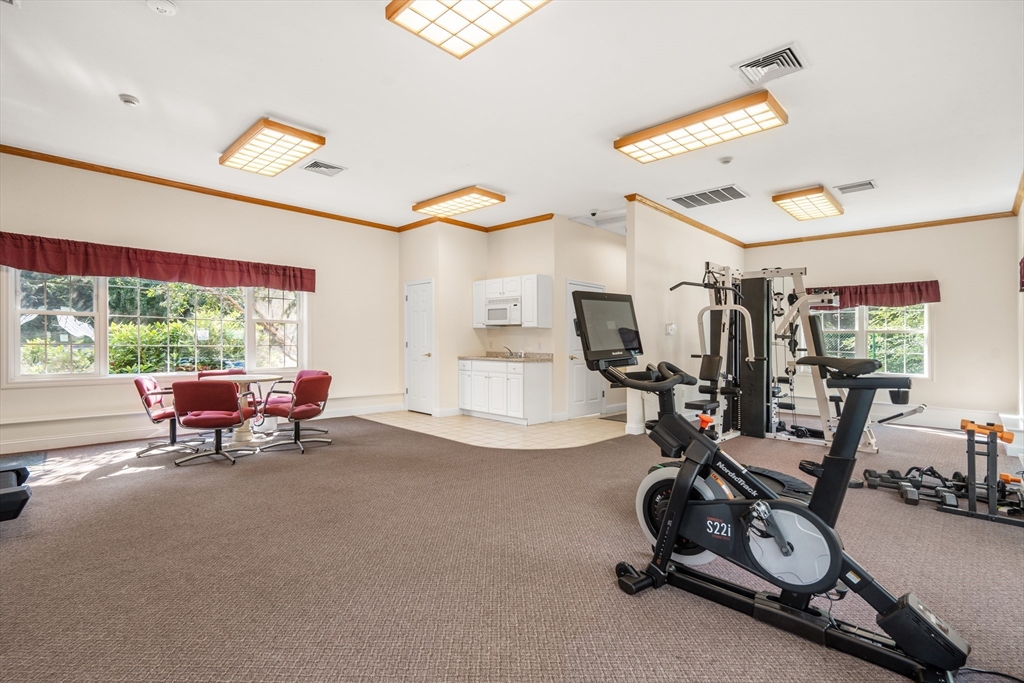 88 Beacon Street, Unit 7 Lawrence, MA 01843 - Photo 28 of 34 a view of a room with gym equipment