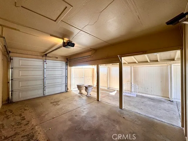 a view of a big room with closet and large window