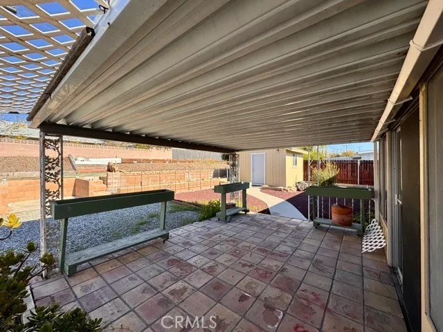 a view of a porch with furniture