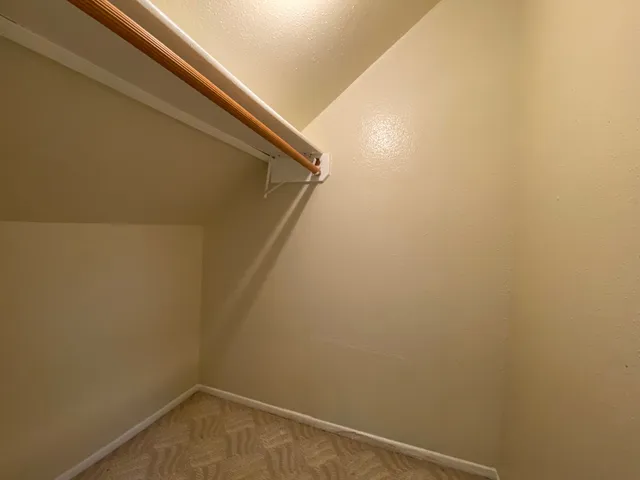 a view of a house with a ceiling fan and a window