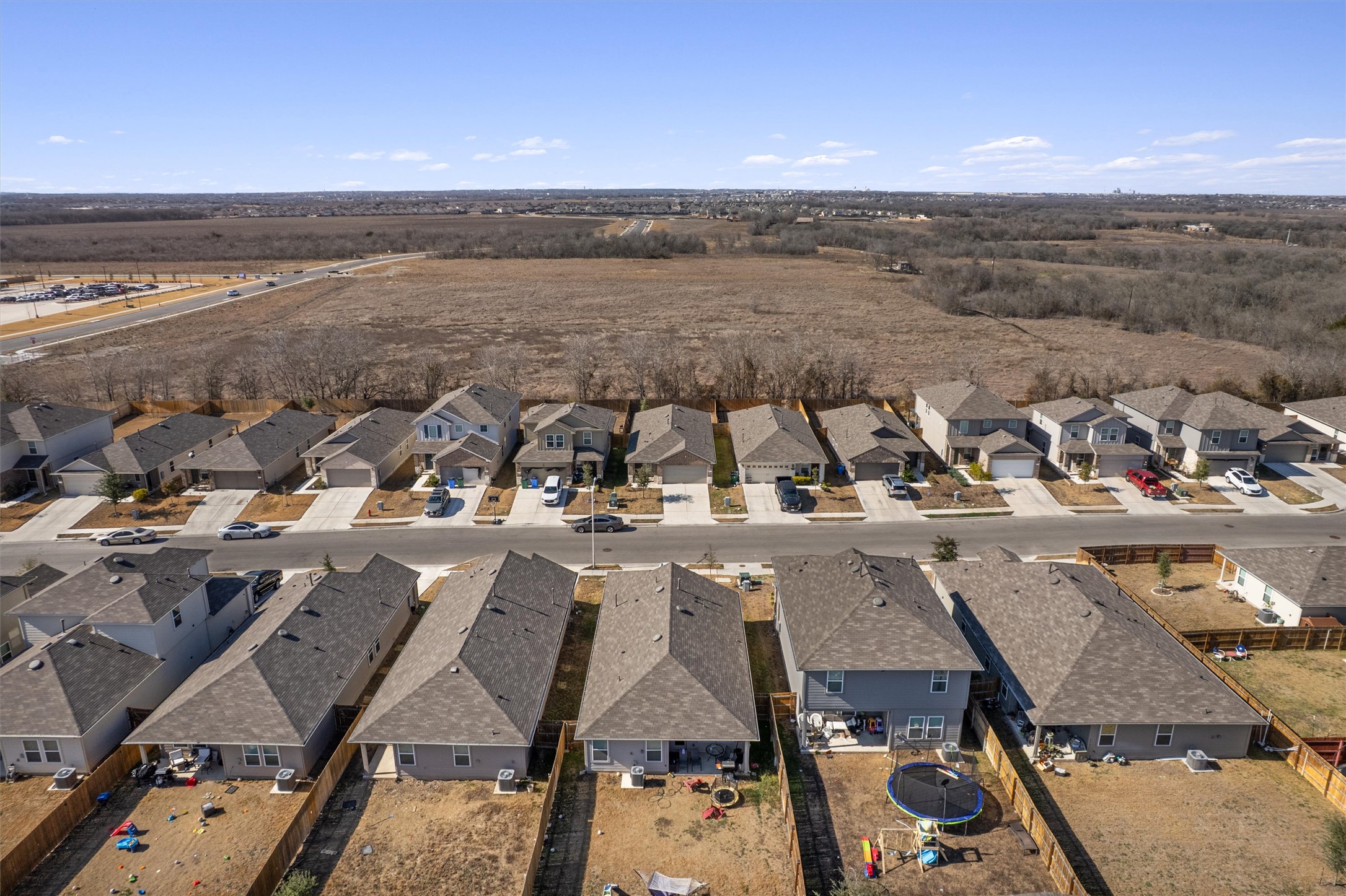 352 Sickle Loop Uhland, TX 78640 - Photo 3 of 36 an aerial view of multiple house