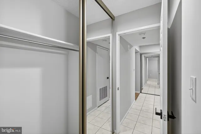 a view of a room with racks on the wall