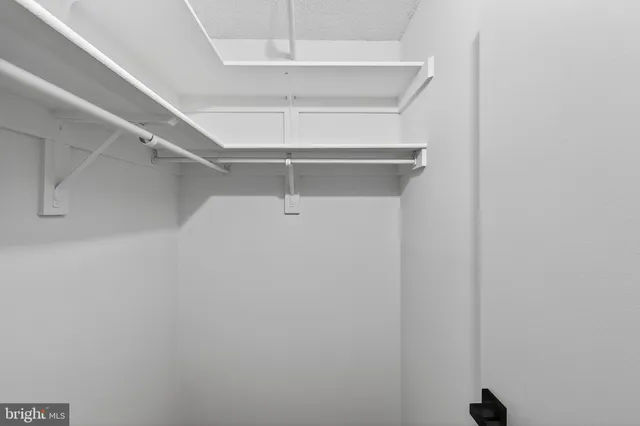 a bathroom with a shower and toilet