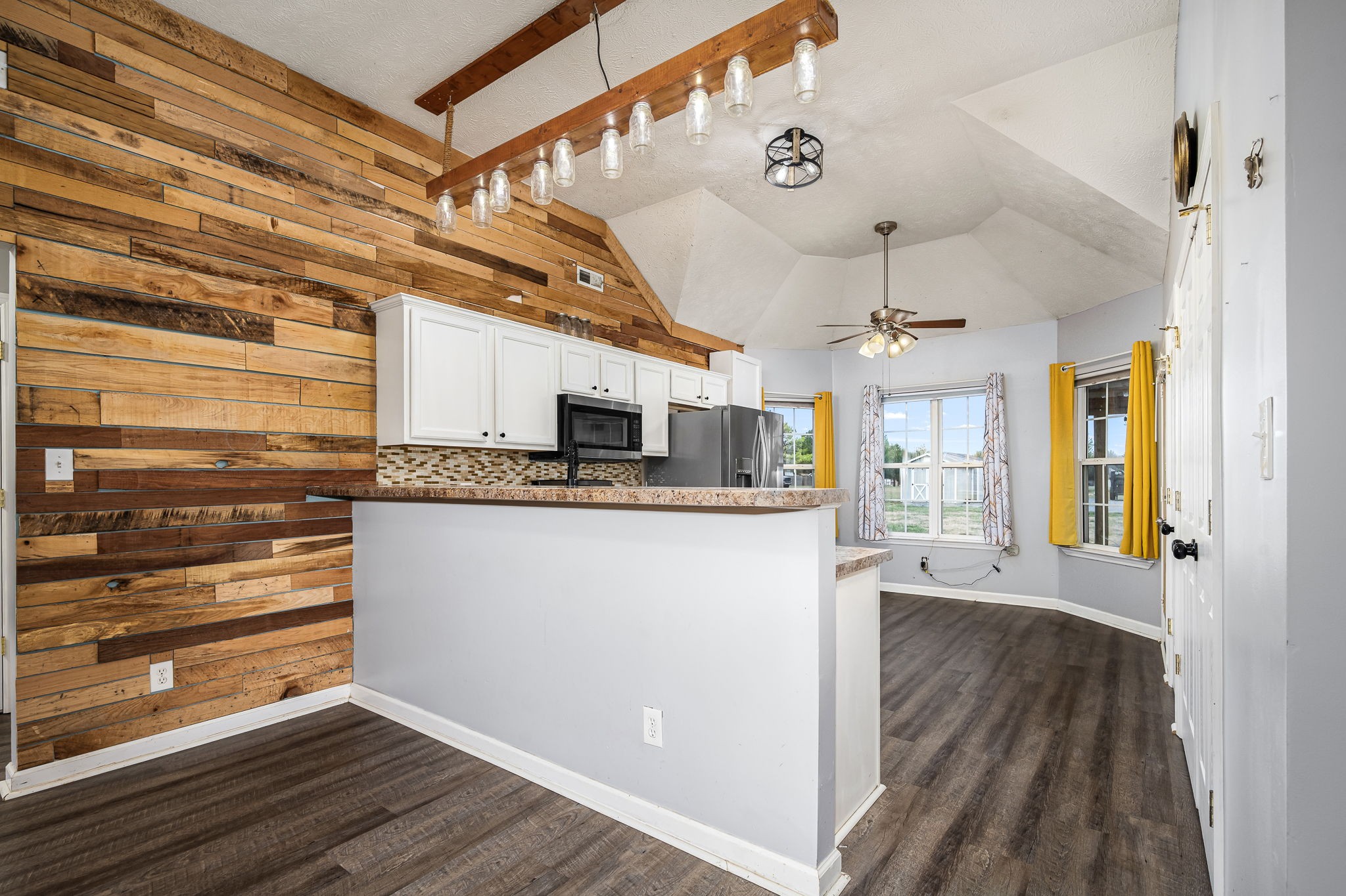 8100 Cedar Forest Road Lascassas, TN 37085 - Photo 11 of 52 a view of a kitchen with wooden floor and cabinets