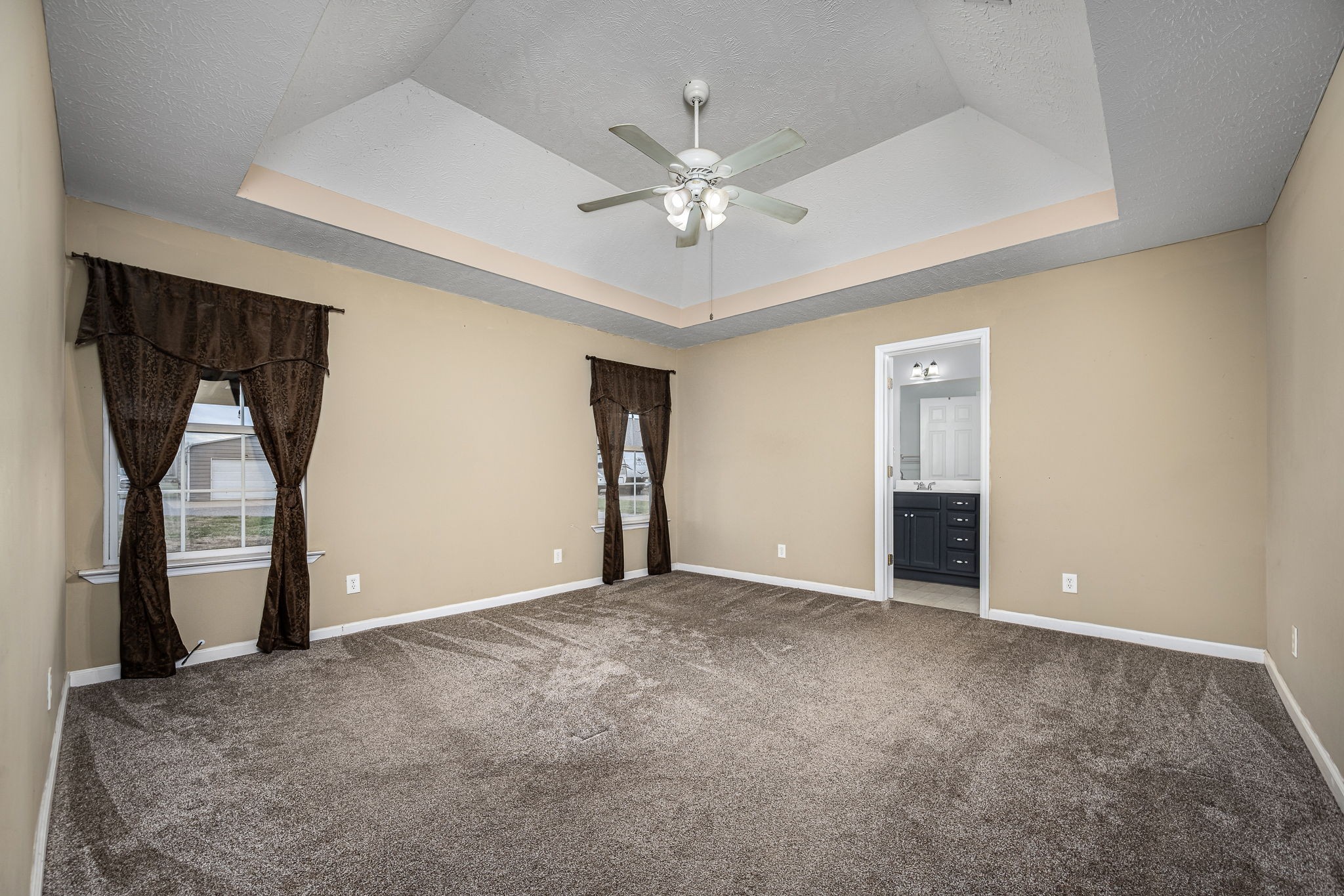 8100 Cedar Forest Road Lascassas, TN 37085 - Photo 19 of 52 a view of an empty room with a ceiling fan