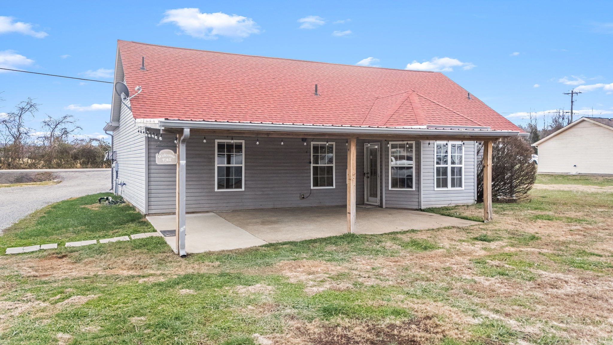 8100 Cedar Forest Road Lascassas, TN 37085 - Photo 39 of 52 a front view of a house with a yard and garage