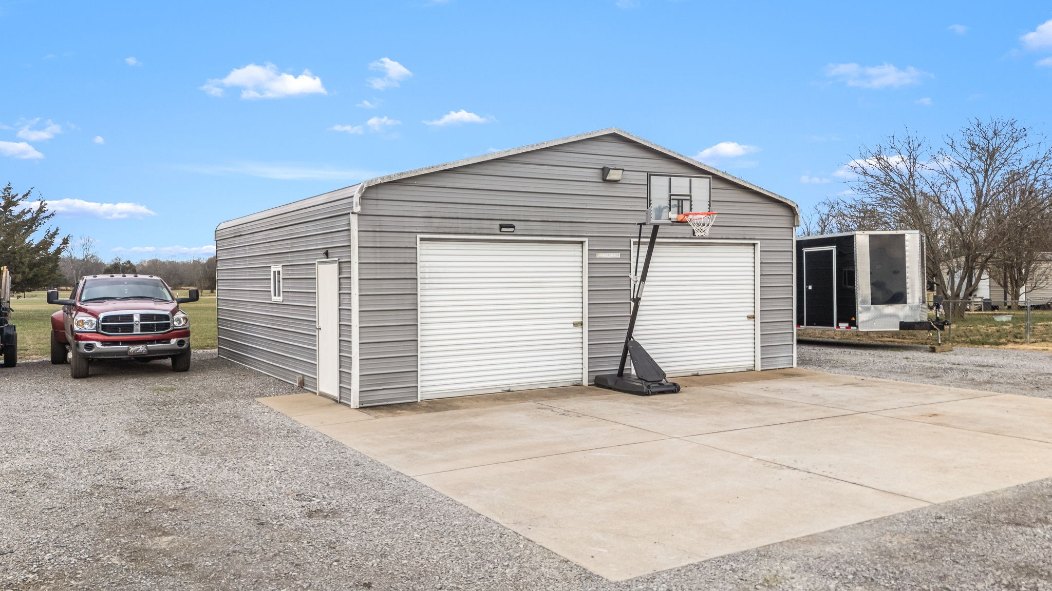 8100 Cedar Forest Road Lascassas, TN 37085 - Photo 41 of 52 a view of a house with a garage