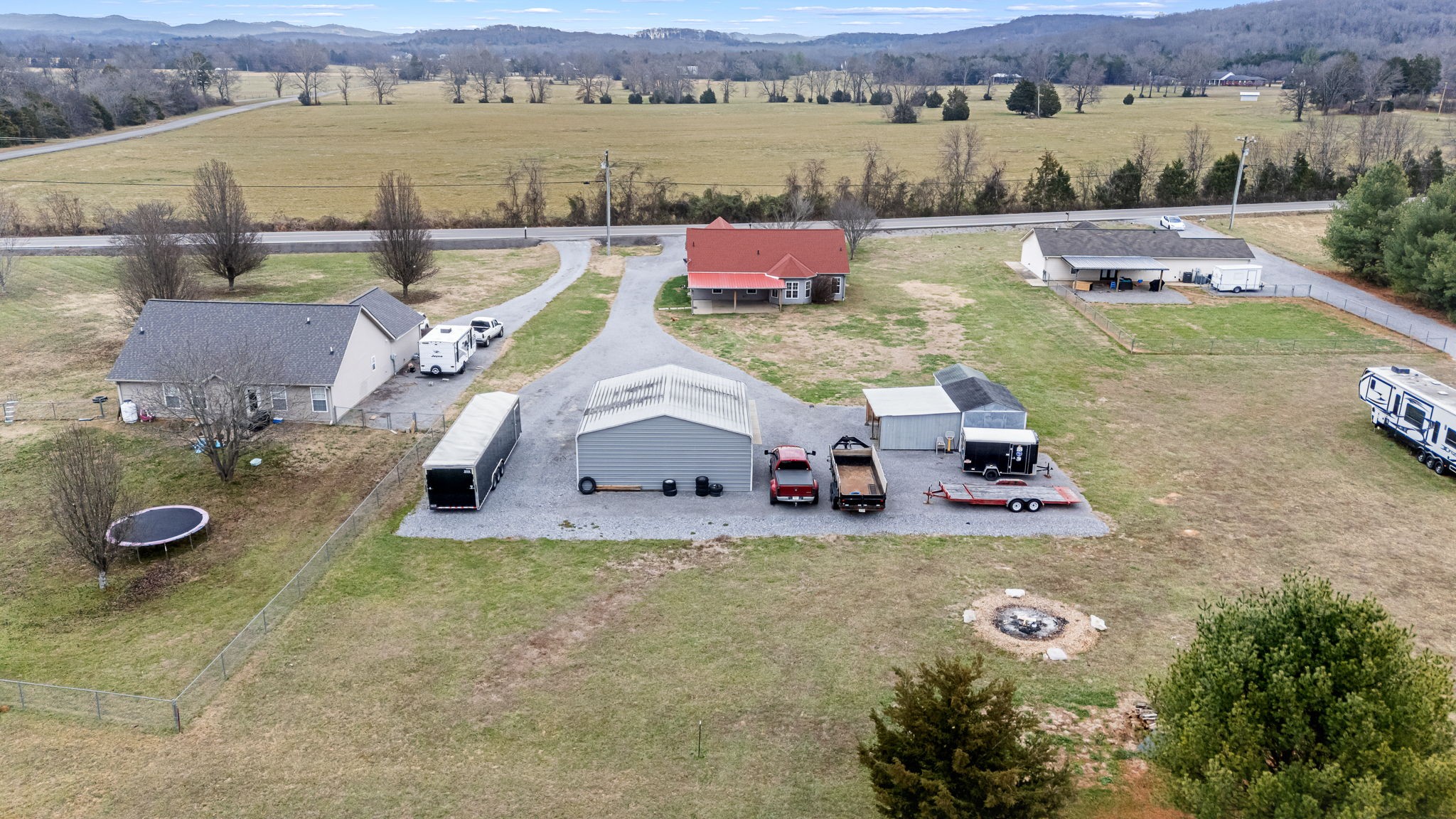 8100 Cedar Forest Road Lascassas, TN 37085 - Photo 49 of 52 an aerial view of a house with pool and lake view