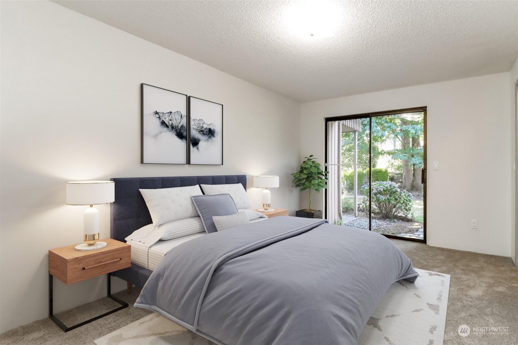 8521 South 259th Street, Unit B15 Kent, WA 98030 - Photo 12 of 26 a bedroom with a bed and a painting on the wall