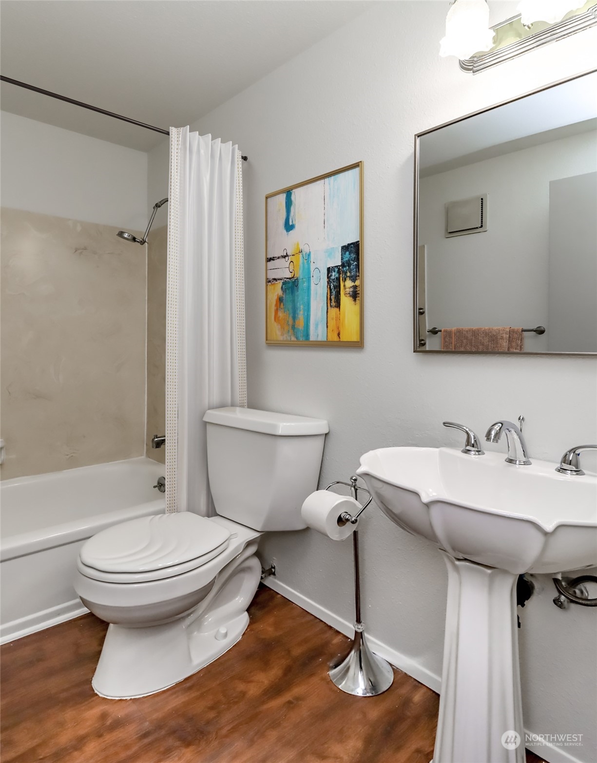8521 South 259th Street, Unit B15 Kent, WA 98030 - Photo 14 of 26 a bathroom with a toilet sink and mirror