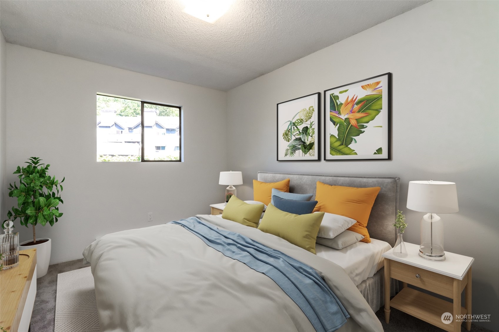 8521 South 259th Street, Unit B15 Kent, WA 98030 - Photo 15 of 26 a bedroom with bed and a potted plant