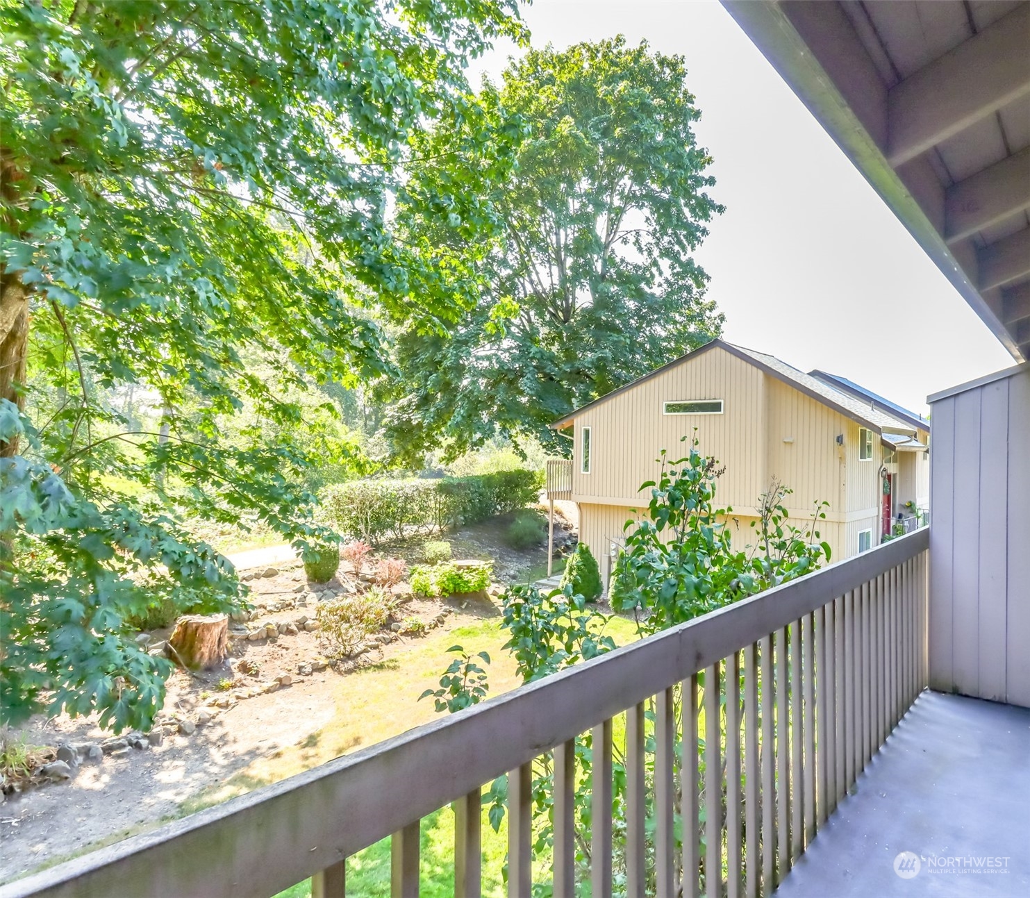 8521 South 259th Street, Unit B15 Kent, WA 98030 - Photo 18 of 26 a view of balcony with wooden floor
