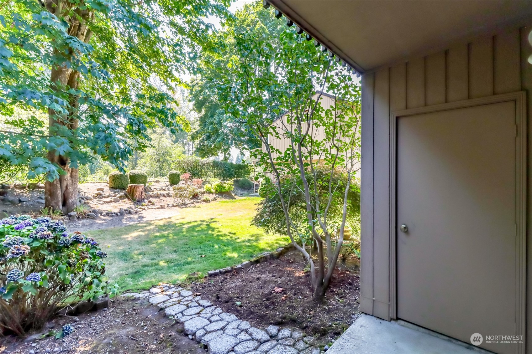 8521 South 259th Street, Unit B15 Kent, WA 98030 - Photo 19 of 26 a view of yard with green space