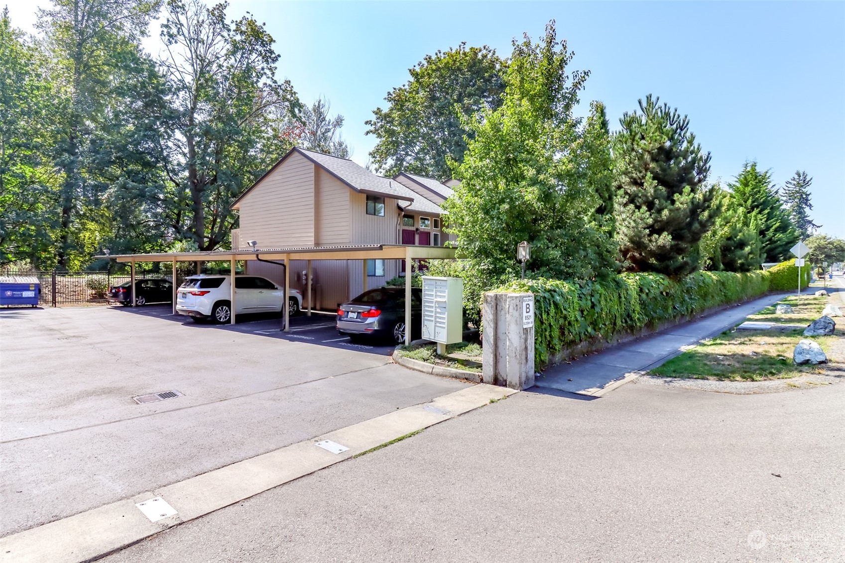 8521 South 259th Street, Unit B15 Kent, WA 98030 - Photo 23 of 26 a view of street with parked cars