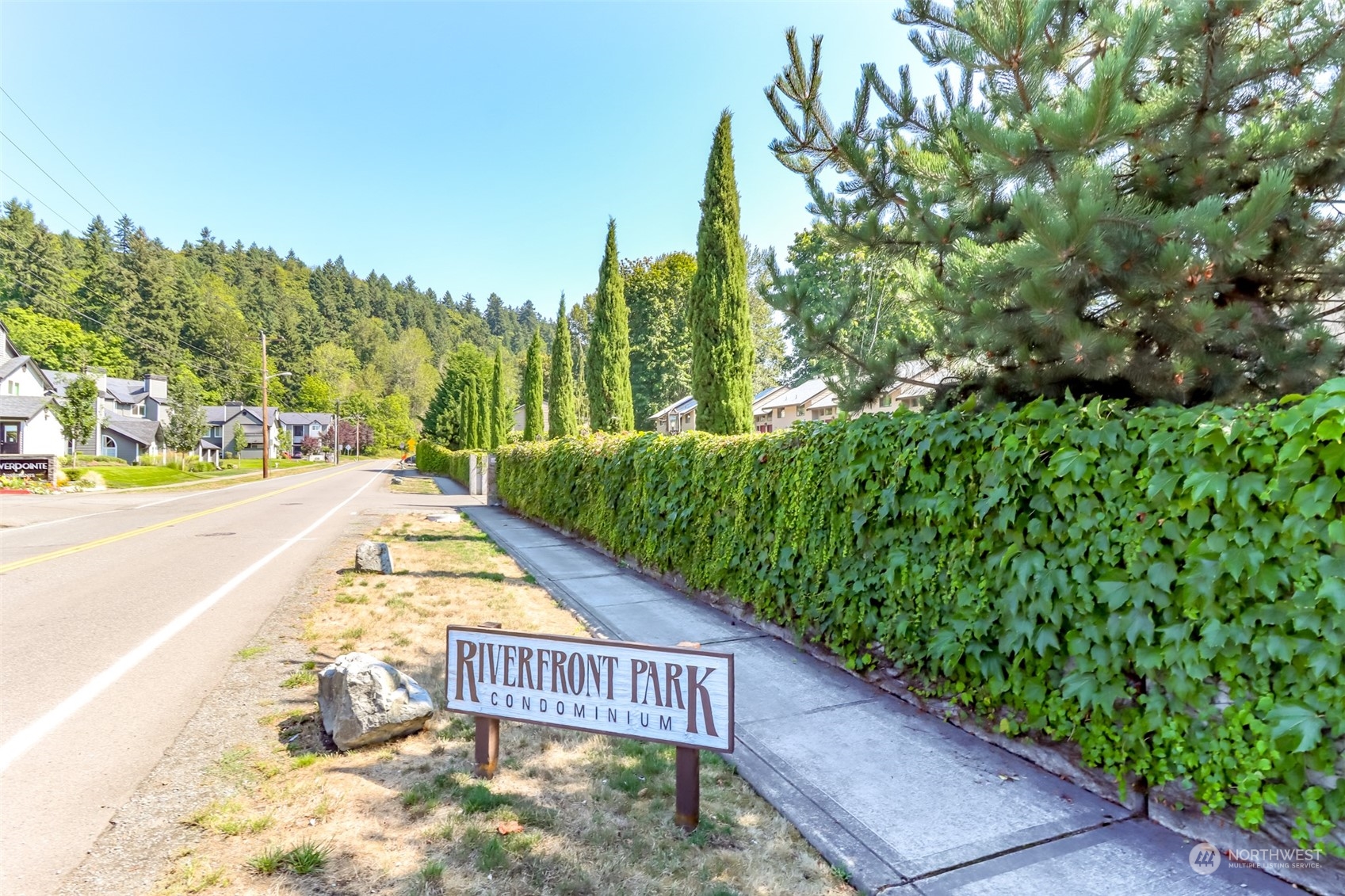 8521 South 259th Street, Unit B15 Kent, WA 98030 - Photo 24 of 26 a view of swimming pool with an outdoor space and seating area