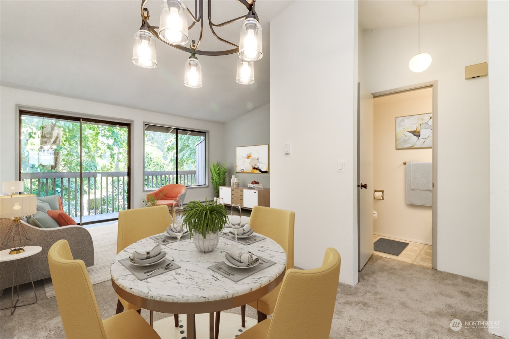 8521 South 259th Street, Unit B15 Kent, WA 98030 - Photo 5 of 26 a view of a dining room with furniture large windows and wooden floor