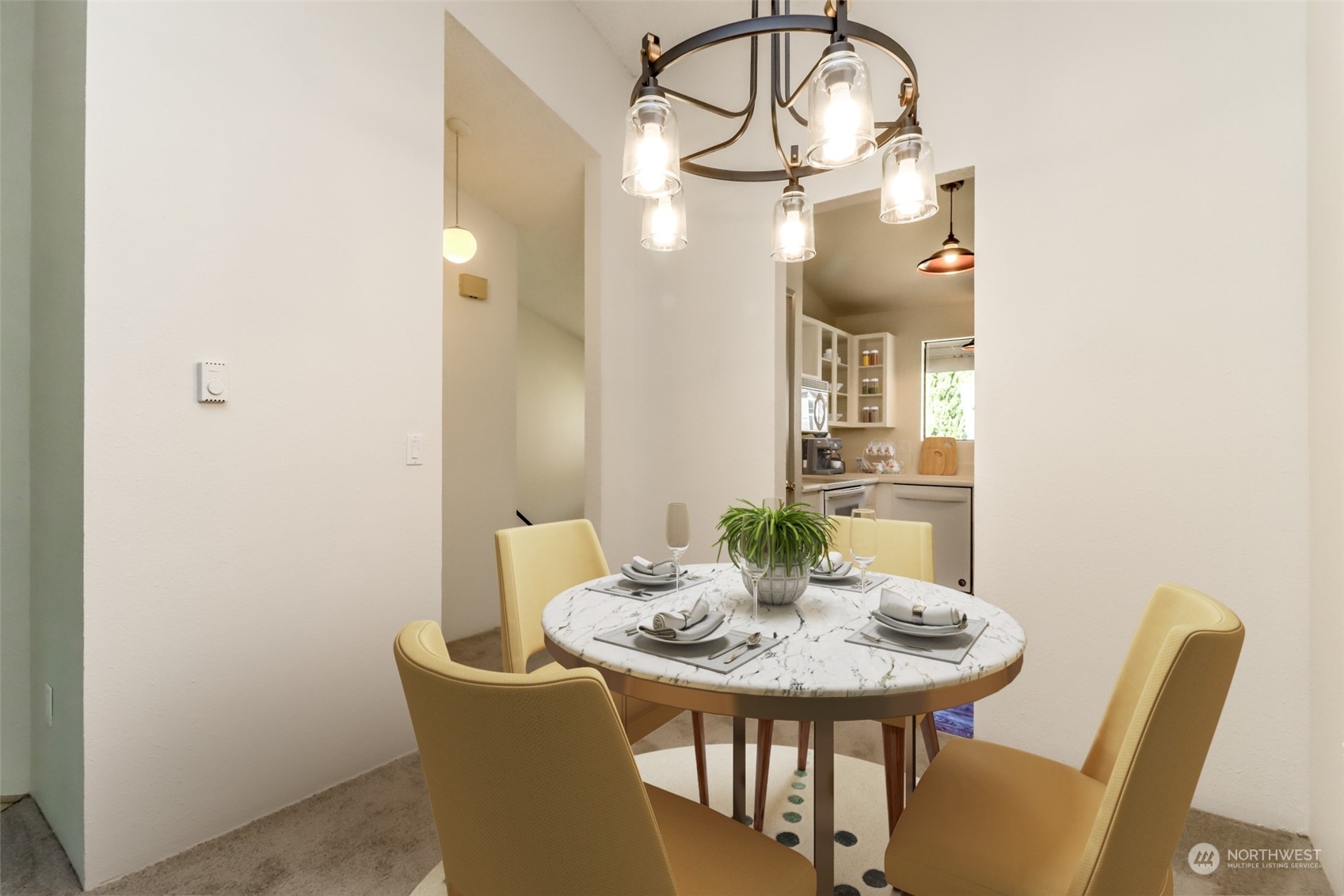 8521 South 259th Street, Unit B15 Kent, WA 98030 - Photo 6 of 26 a view of a dining room with furniture and wooden floor