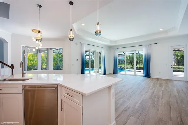 a view of a kitchen and window