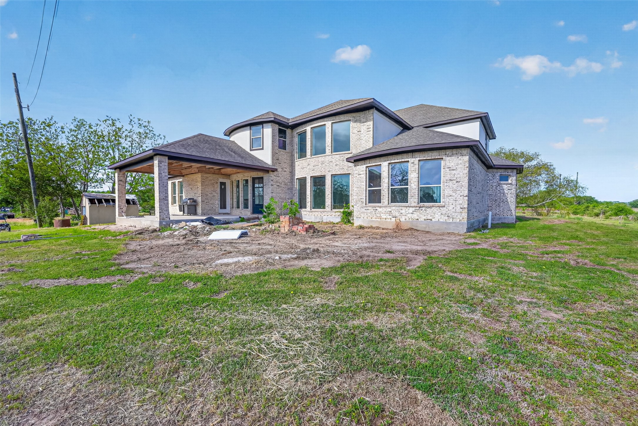 8023 Pool Hill Road Fulshear, TX 77441 - Photo 23 of 50 a front view of a house with a yard