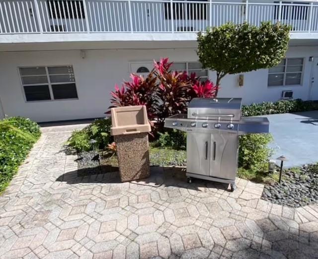 120 Northeast 20th Avenue, Unit 30 Deerfield Beach, FL 33441 - Photo 11 of 14 a view of a entryway with flower pots
