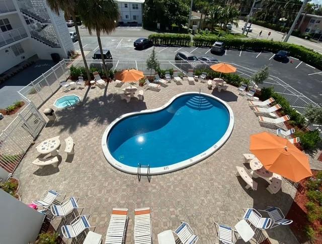 120 Northeast 20th Avenue, Unit 30 Deerfield Beach, FL 33441 - Photo 14 of 14 an aerial view of a swimming pool with outdoor seating