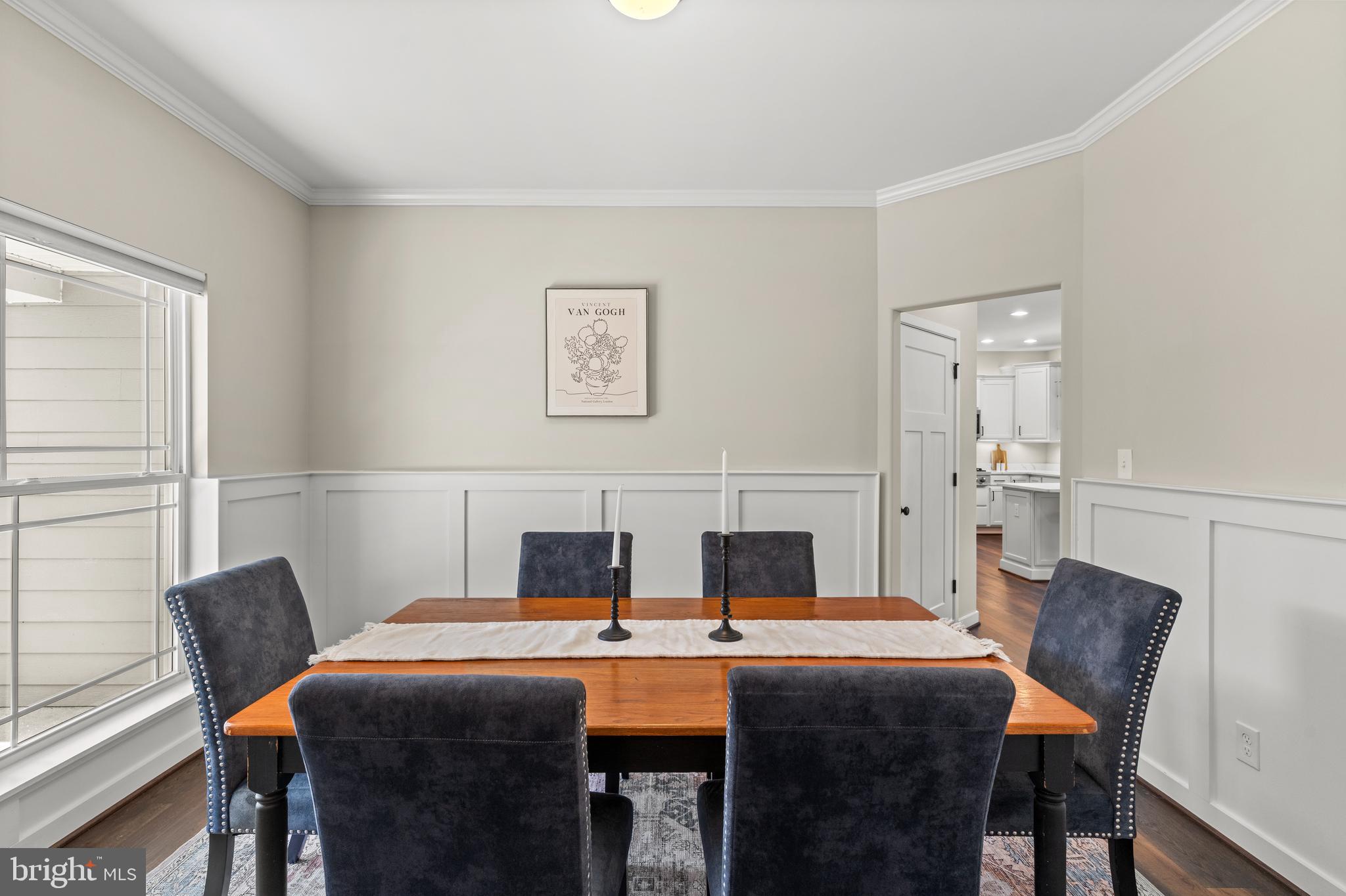 7195 Compass Court King George, VA 22485 - Photo 17 of 58 a view of a dining room with furniture and wooden floor