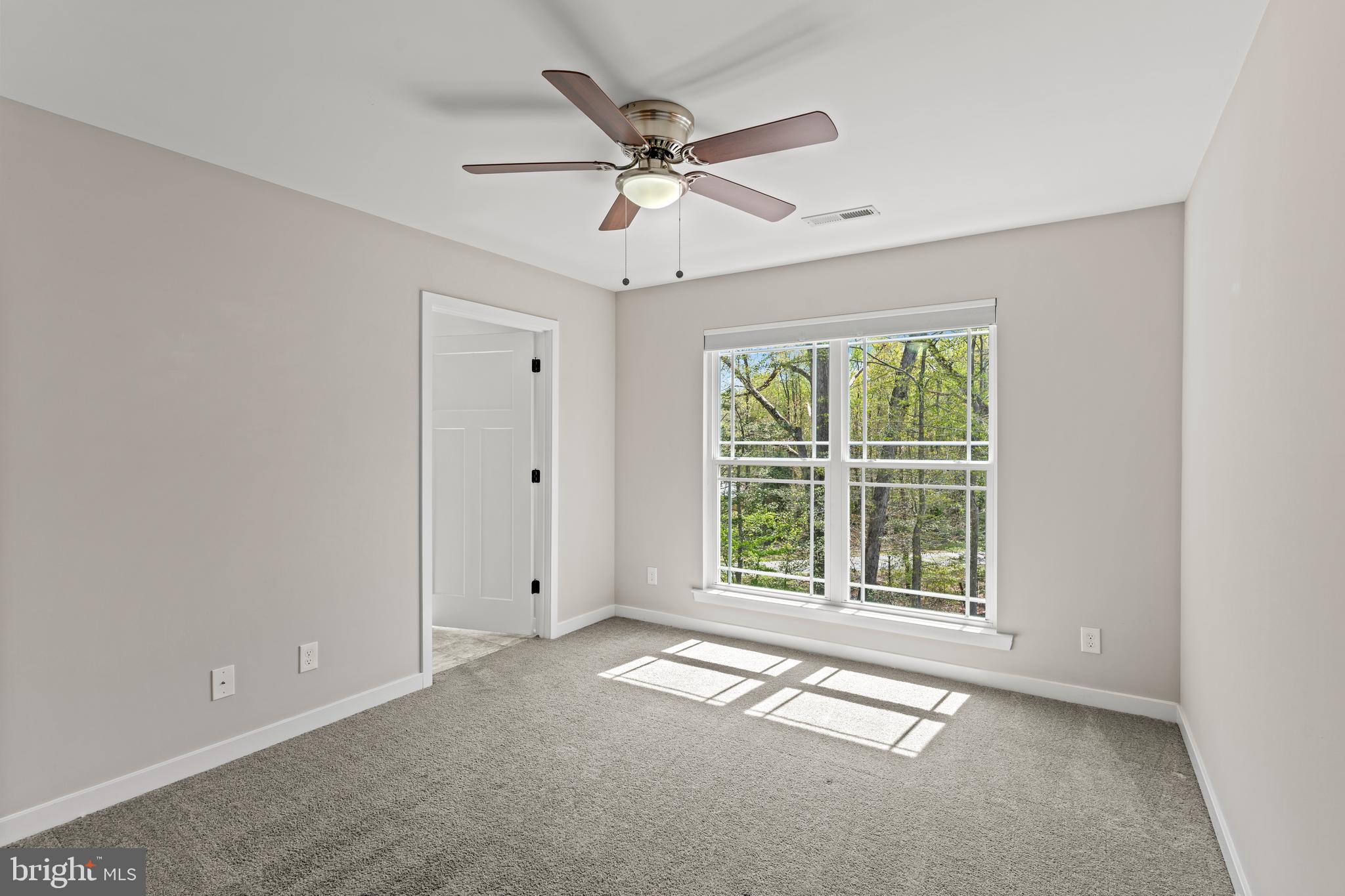 7195 Compass Court King George, VA 22485 - Photo 30 of 58 a view of an empty room with a window