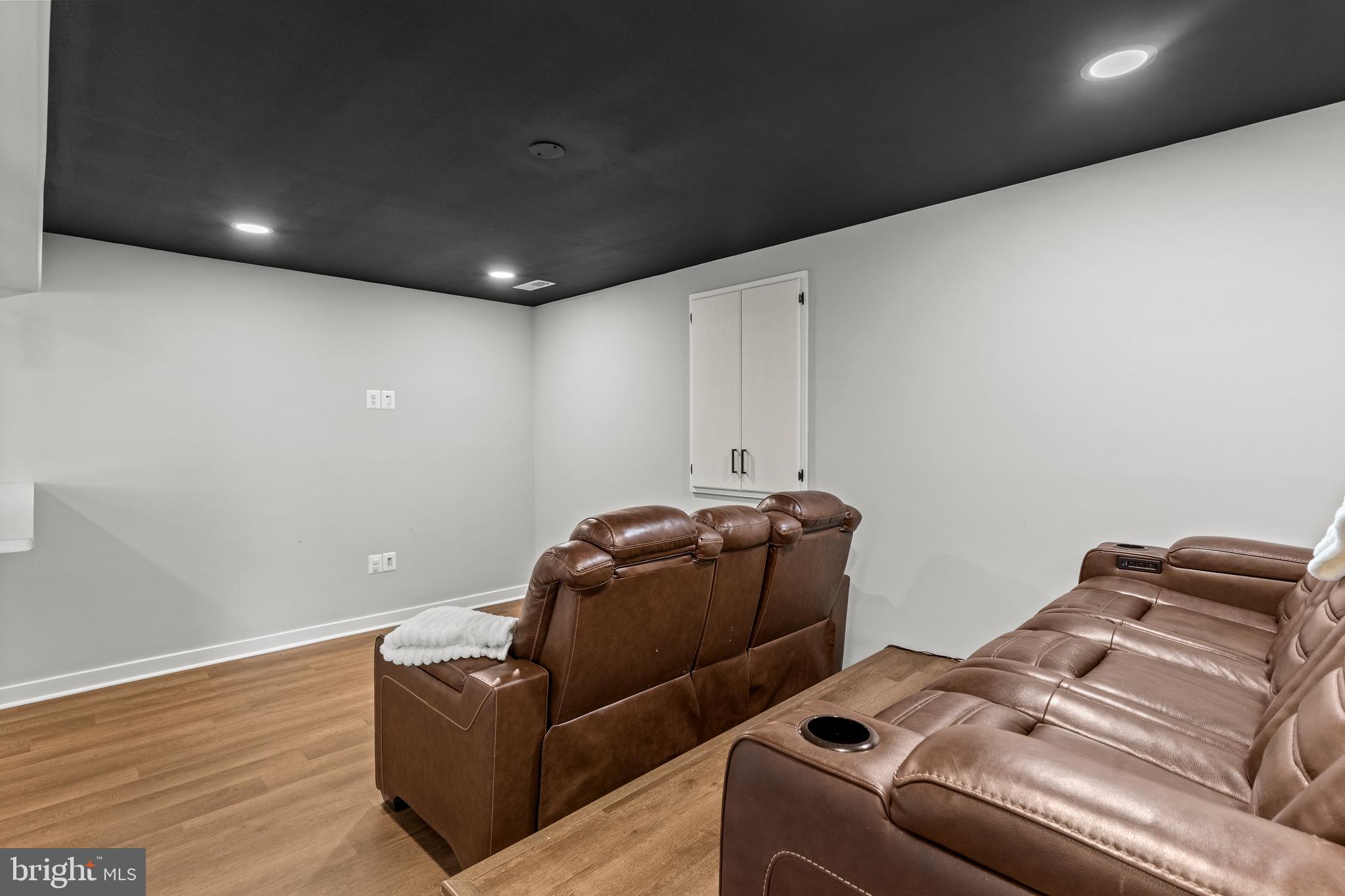 7195 Compass Court King George, VA 22485 - Photo 41 of 58 a room with furniture and stairs