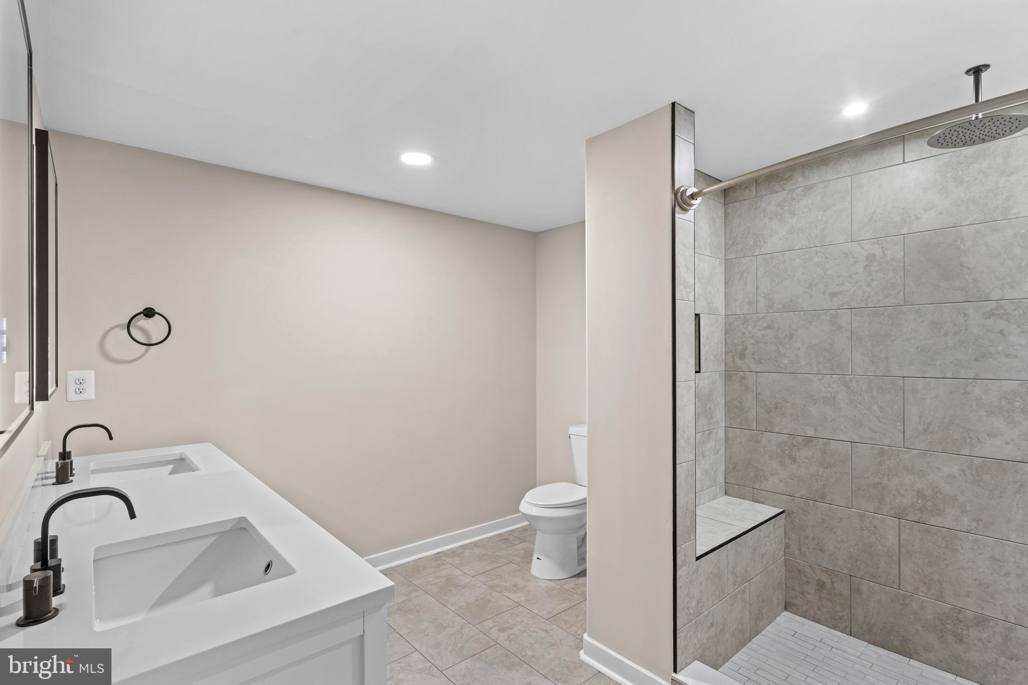 7195 Compass Court King George, VA 22485 - Photo 47 of 58 a bathroom with a sink a toilet and shower