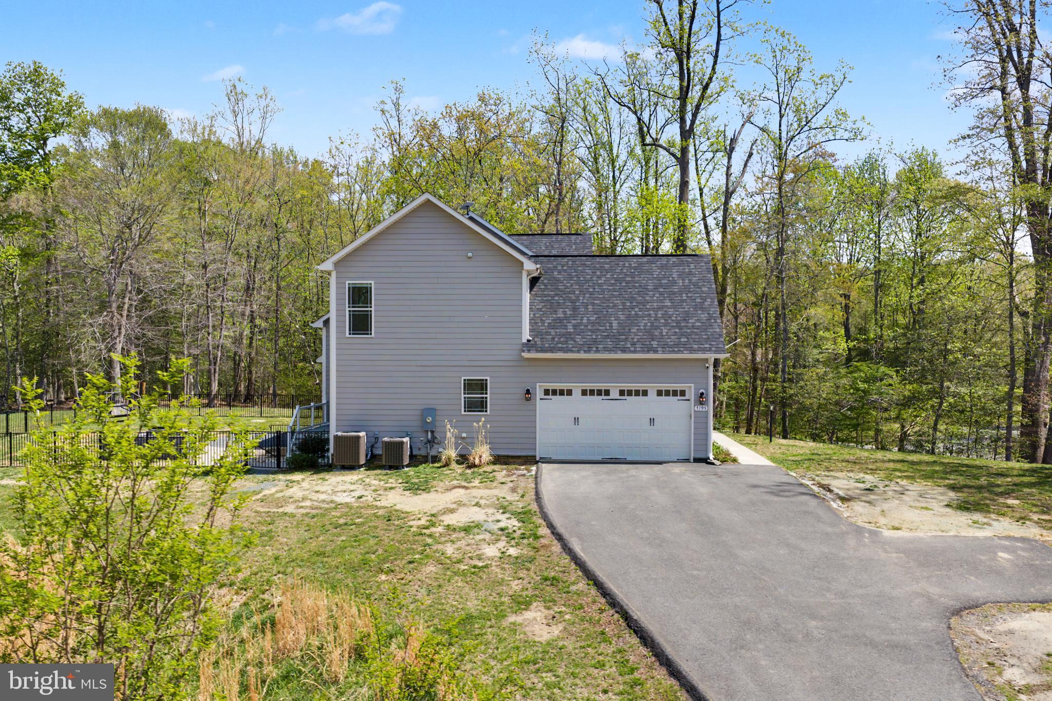 7195 Compass Court King George, VA 22485 - Photo 50 of 58 a house view with a outdoor space