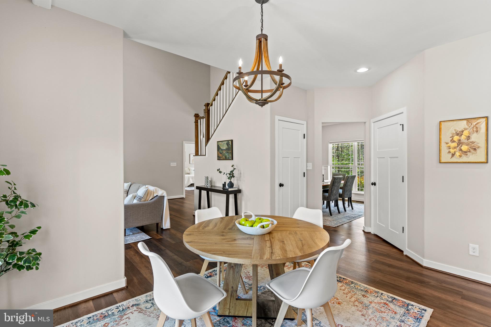 7195 Compass Court King George, VA 22485 - Photo 51 of 58 a view of a dining room with furniture and wooden floor