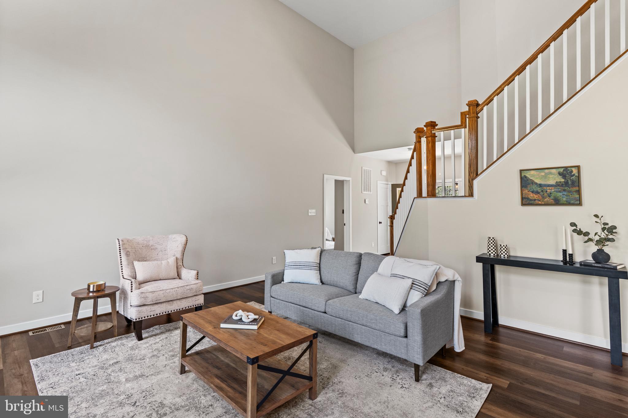 7195 Compass Court King George, VA 22485 - Photo 57 of 58 a living room with furniture and wooden floor