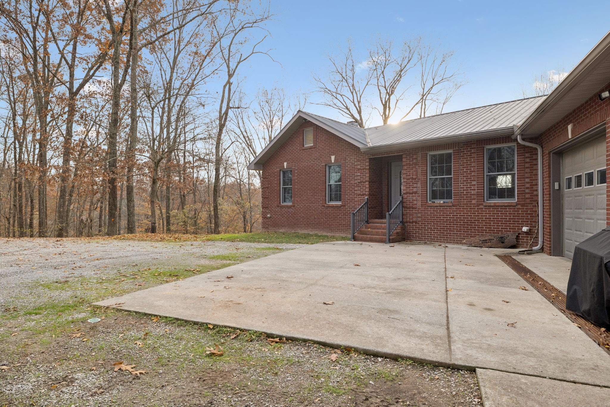 516 Rhotons Chapel Road Manchester, TN 37355 - Photo 7 of 55 a front view of a house with a yard