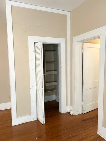a kitchen with stainless steel appliances granite countertop cabinets and a refrigerator