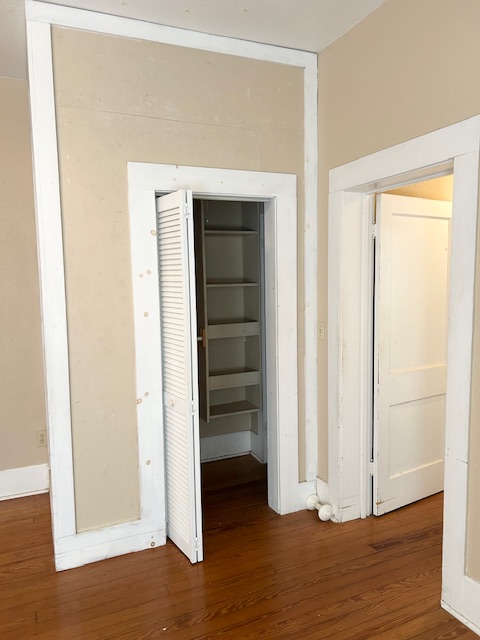 413 Fowzer Street Taylor, TX 76574 - Photo 5 of 9 a view of a room with wooden floor