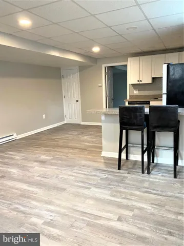 a view of kitchen with furniture and window