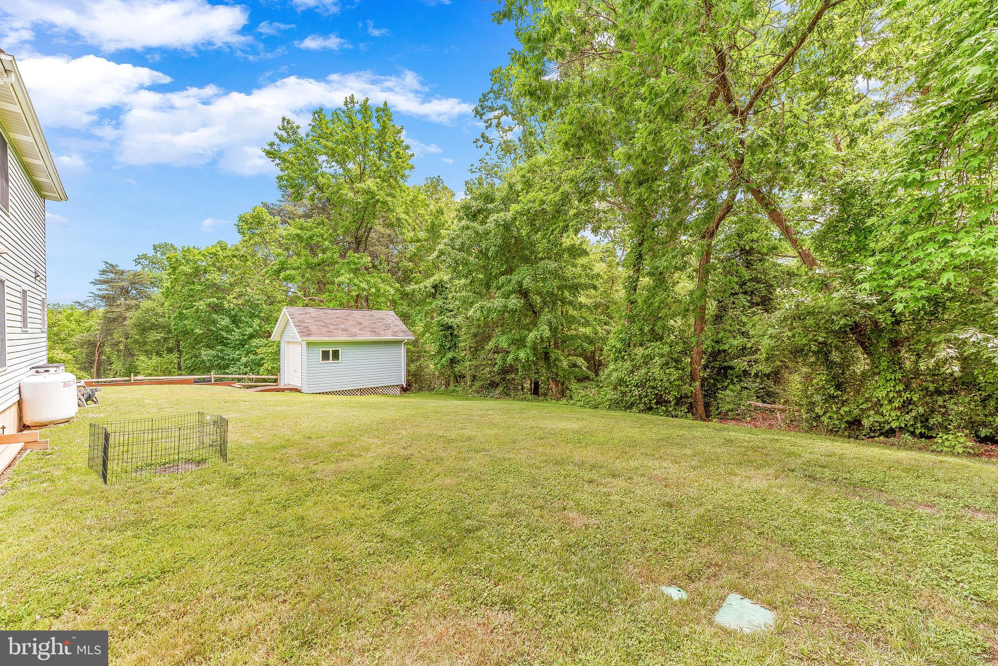 2717 Cove Point Road Lusby, MD 20657 - Photo 36 of 38 Private Back Yard w/ Underground Sprinkler System