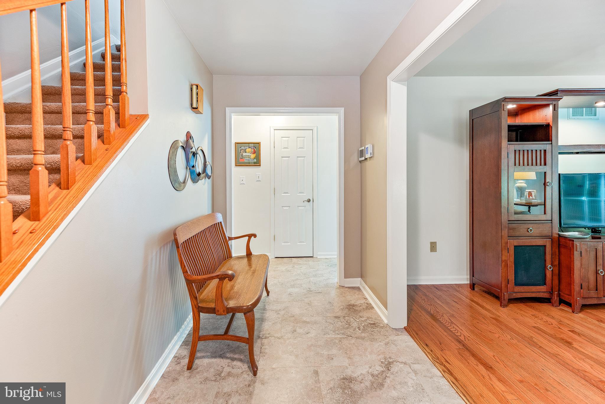2717 Cove Point Road Lusby, MD 20657 - Photo 8 of 38 Foyer w/ Waterproof Luxury Laminate Flooring!