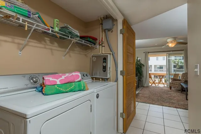 a view of a garden with a building in the background