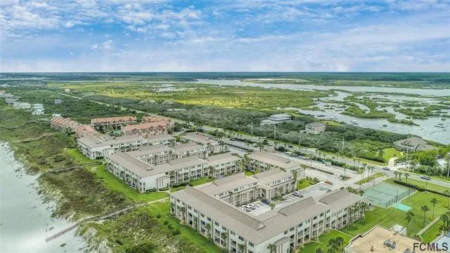 a view of a city with an ocean