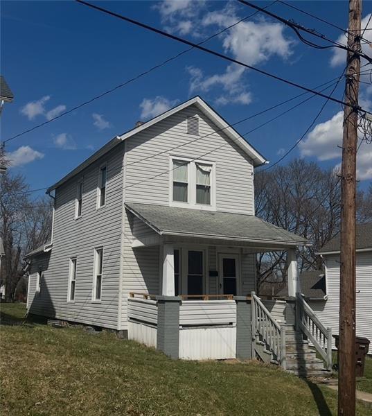 418 Ellsworth Street Sharon, PA 16146 - Photo 2 of 2 a front view of a house with a yard