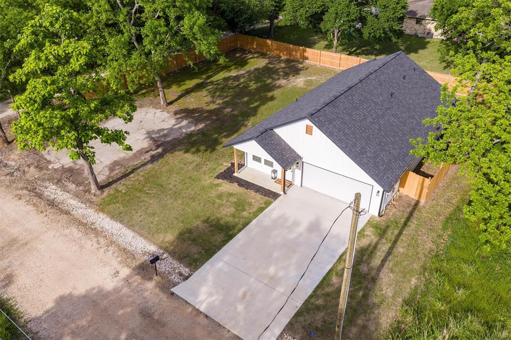 801 Southeast 4th Street Cooper, TX 75432 - Photo 2 of 37 a view of a yard with an outdoor space