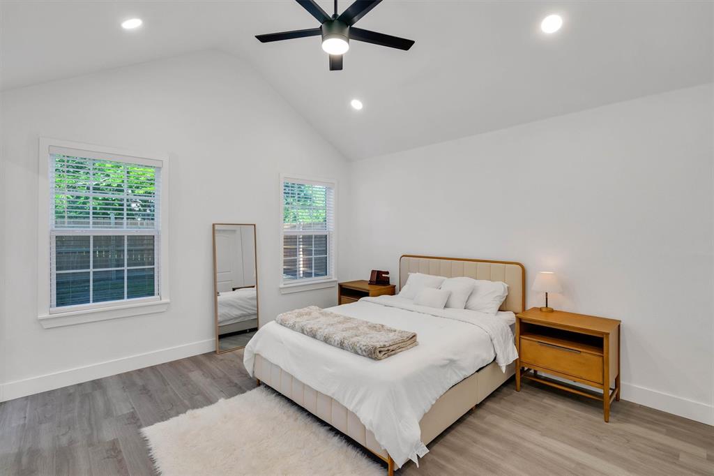 801 Southeast 4th Street Cooper, TX 75432 - Photo 21 of 37 a bedroom with a bed and window