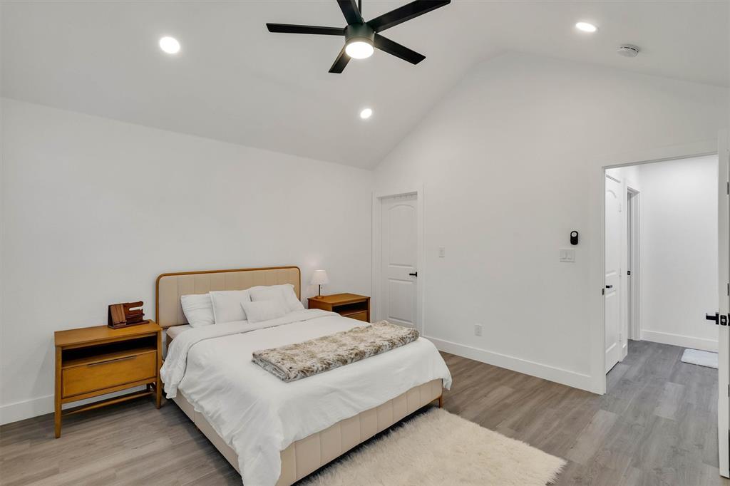 801 Southeast 4th Street Cooper, TX 75432 - Photo 22 of 37 a bedroom with a bed and a ceiling fan