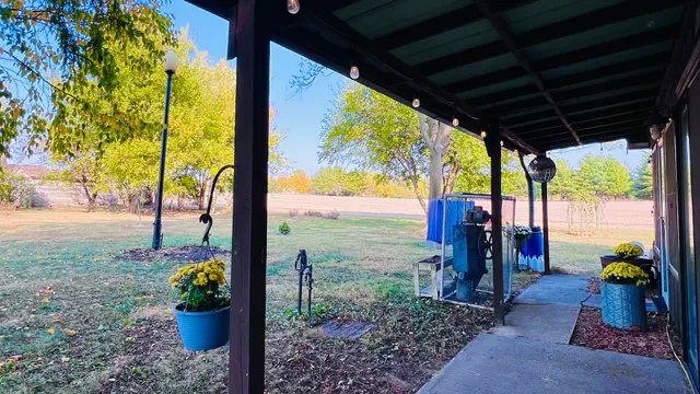 a view of a porch with garden
