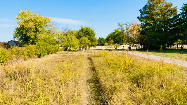 a view of swimming pool with an outdoor space and seating area